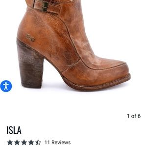 ISLA, a leather heeled bootie w/ ankle strap & vintage buckle accent.
